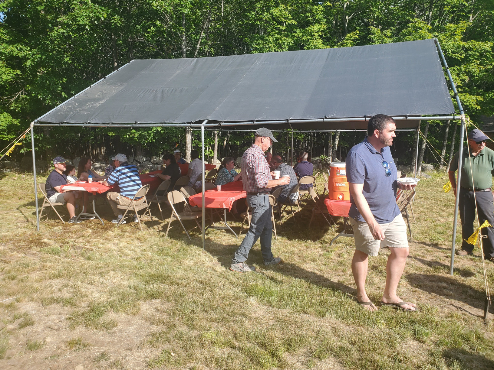 Guests gathered outdoors for refreshments at the Strawberry Festival at Bell Hill Meetinghouse.