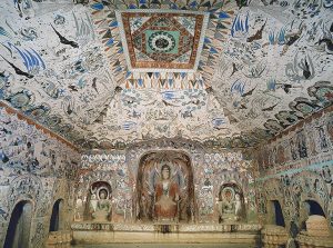 Interior, Cave of a Thousand Buddhas. Decorated walls and ceiling inside a Buddhist cave temple.
