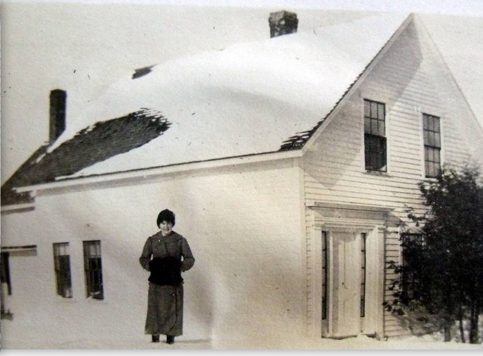 Elvira Edwards (Welch), pictured in front of the Edwards family home on Scribner Hill Road Donated by Joan Welch Wilfong