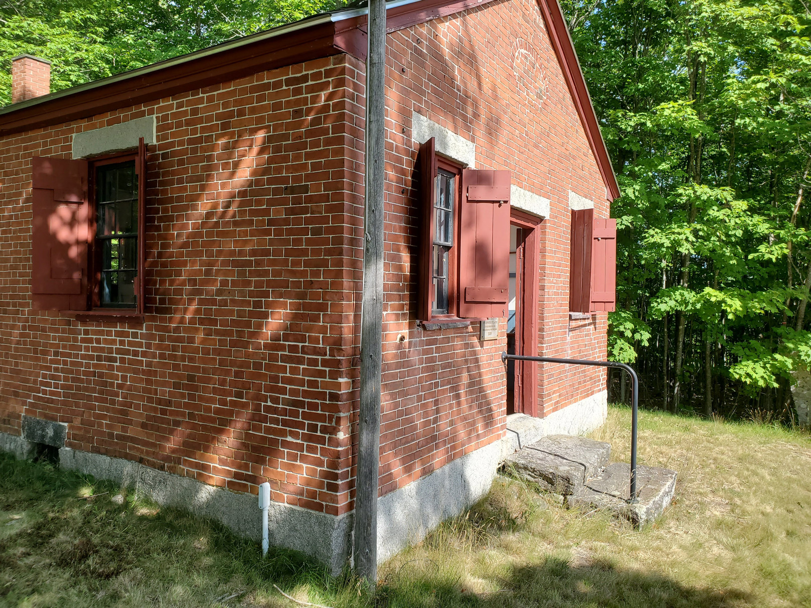 Exterior of the brick schoolhouse at Bell Hill