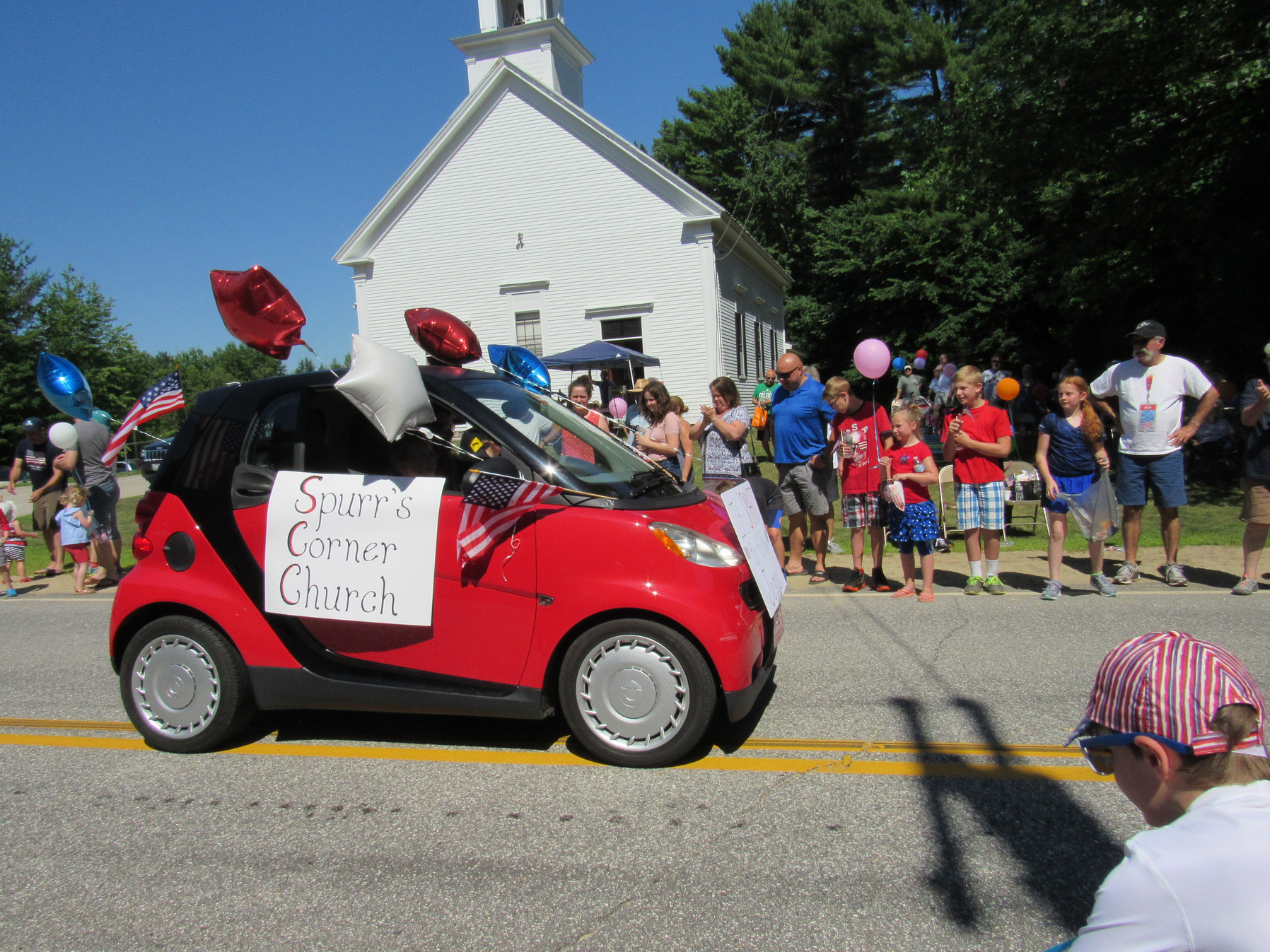 Spurr’s Corner Church car decorated with balloons at the Fourth of July parade.