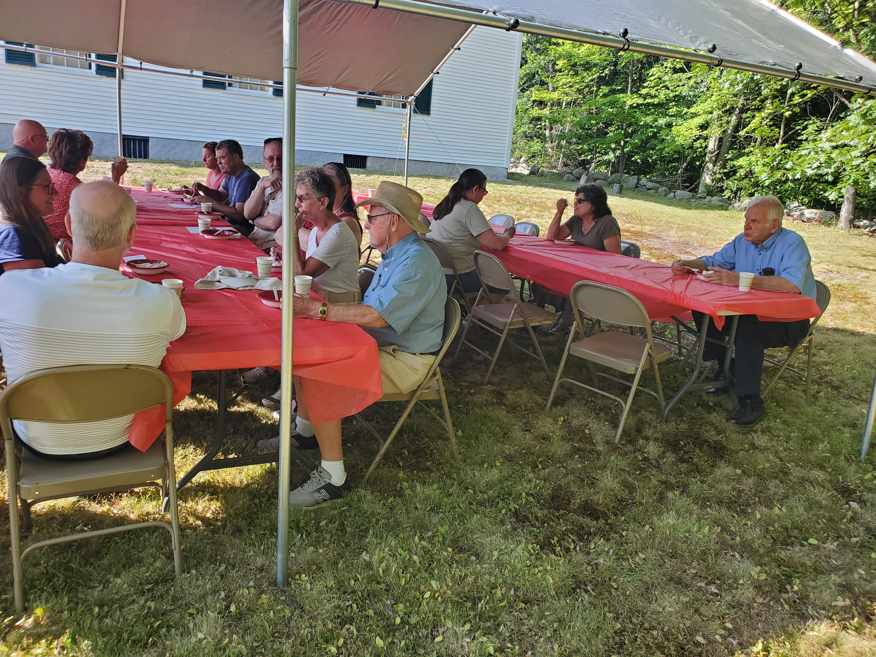 Guests gathered outdoors for refreshments at the Strawberry Festival at Bell Hill Meetinghouse.