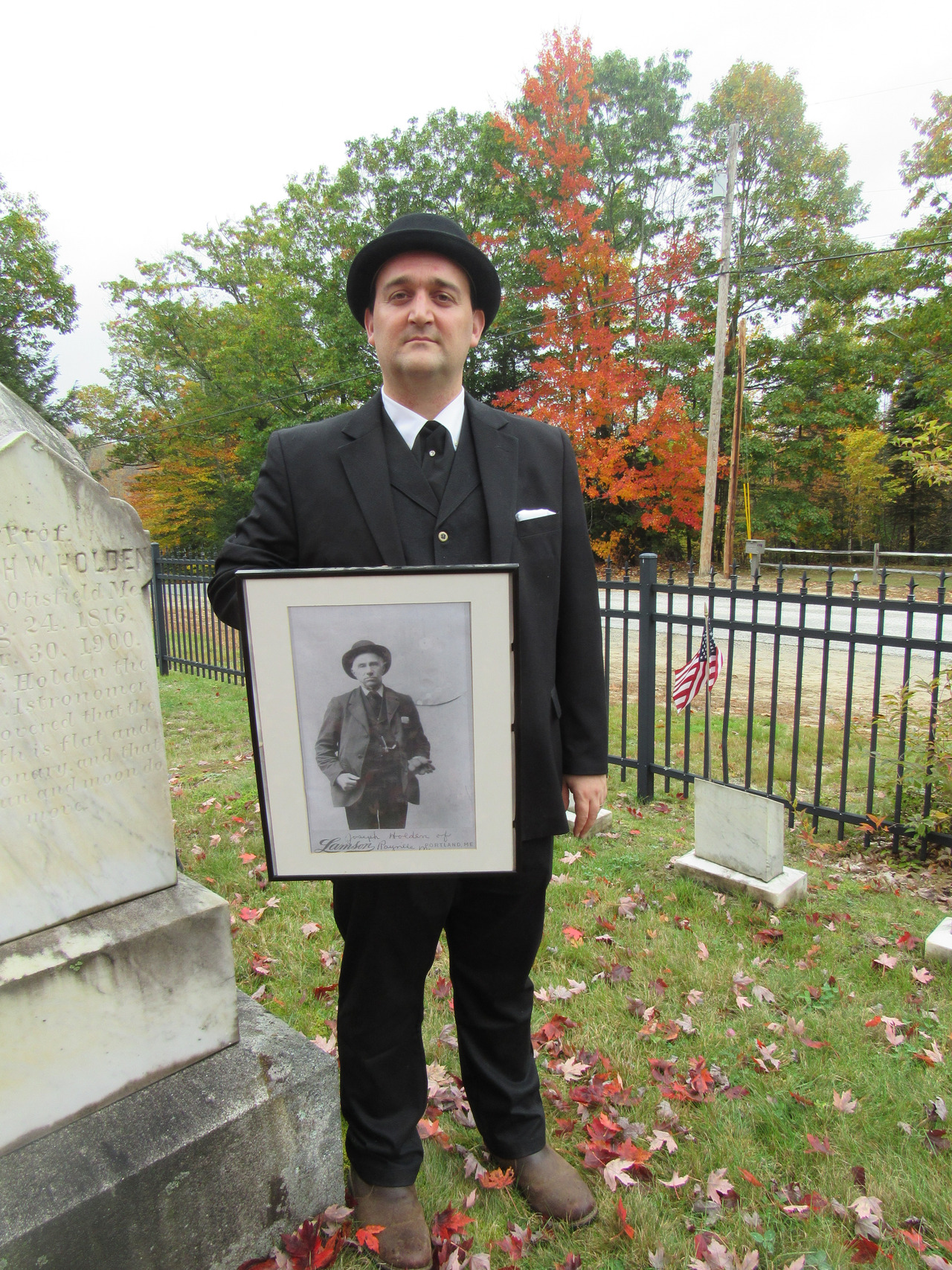 Derek Dorr with photo of Joe Holden