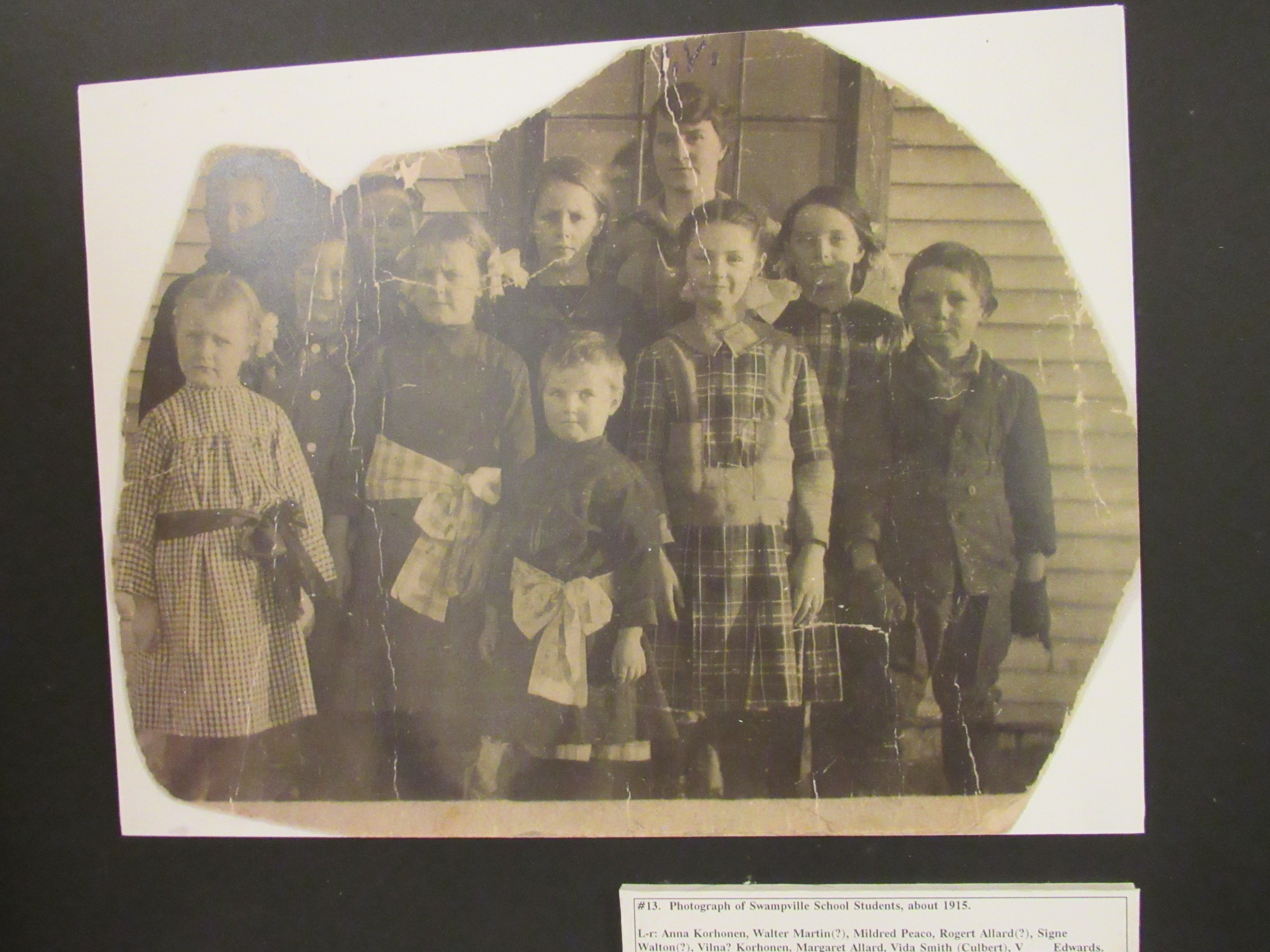 Swampville School pupils, about 1915. A companion identification sheet records the names associated with this photograph.