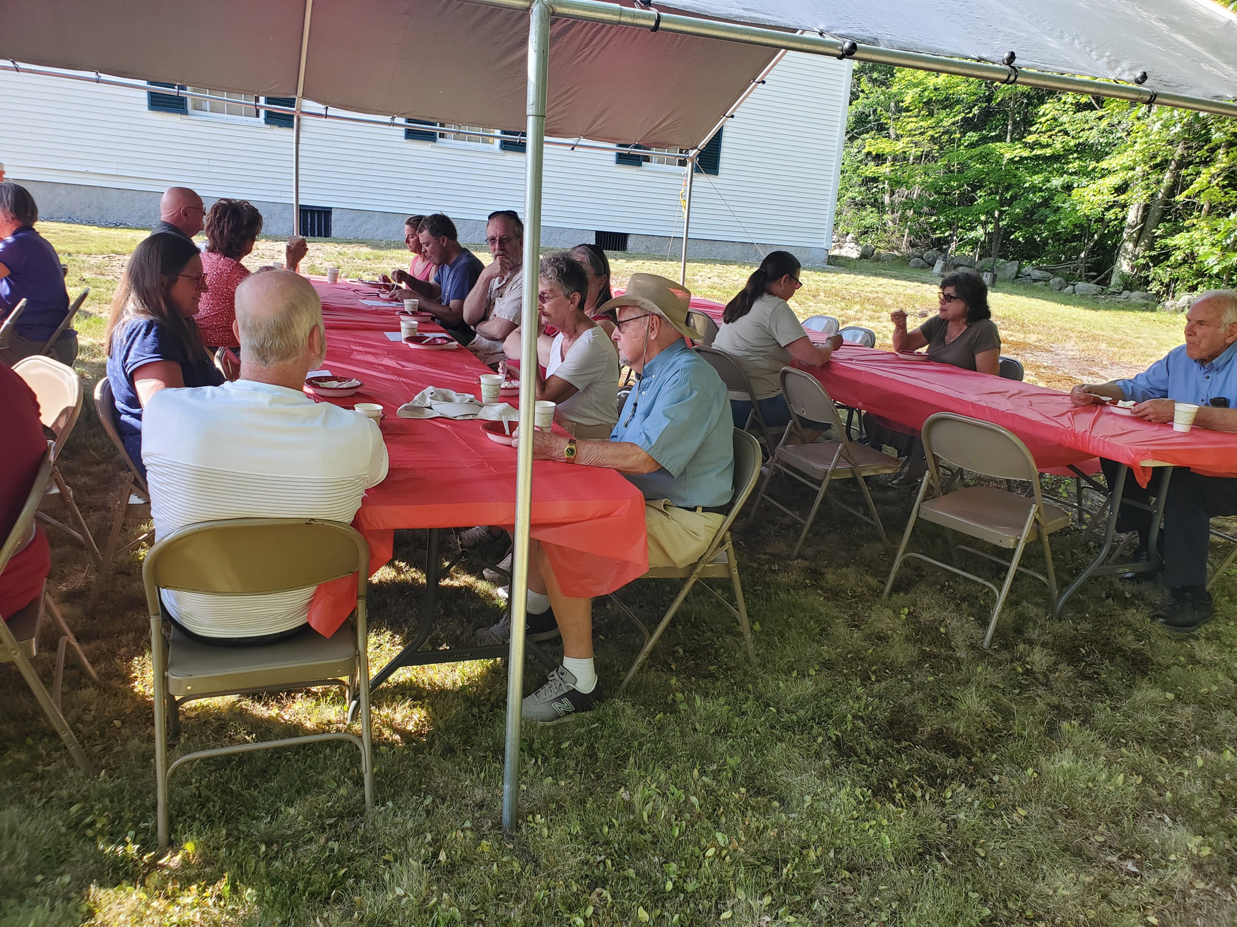 Guests gathered outdoors for refreshments at the Strawberry Festival at Bell Hill Meetinghouse.