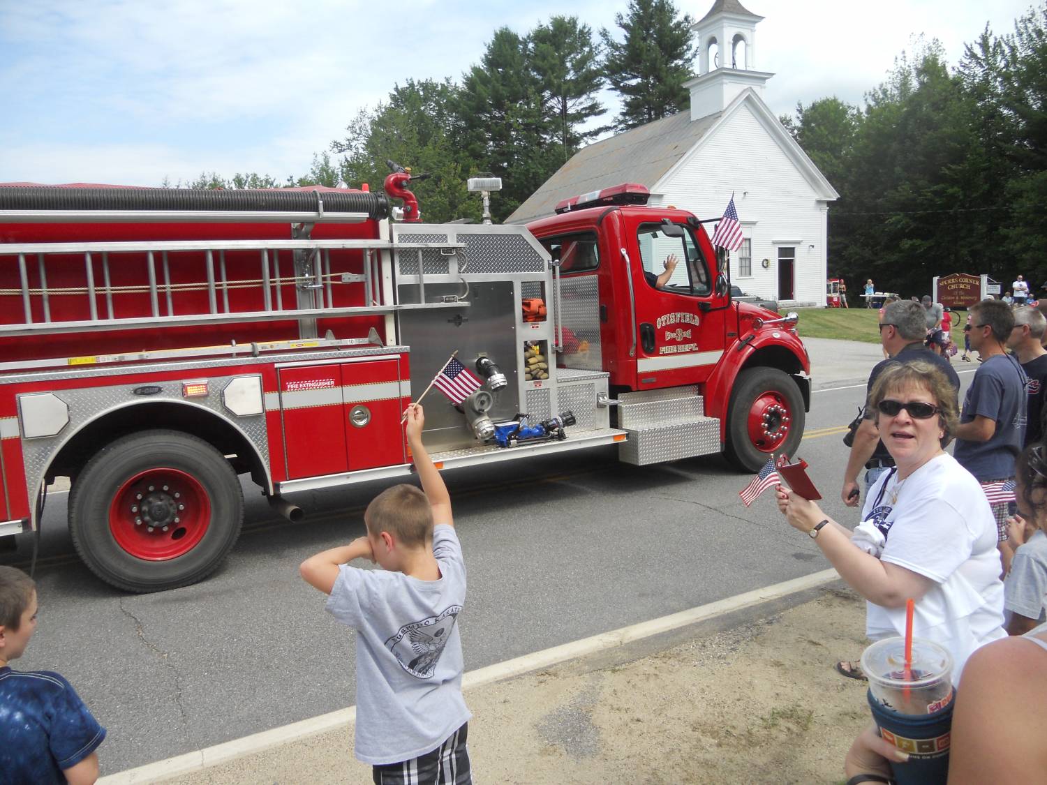 Parade, July 4, 2013, with fire engine Spurr’s Corner Church in background