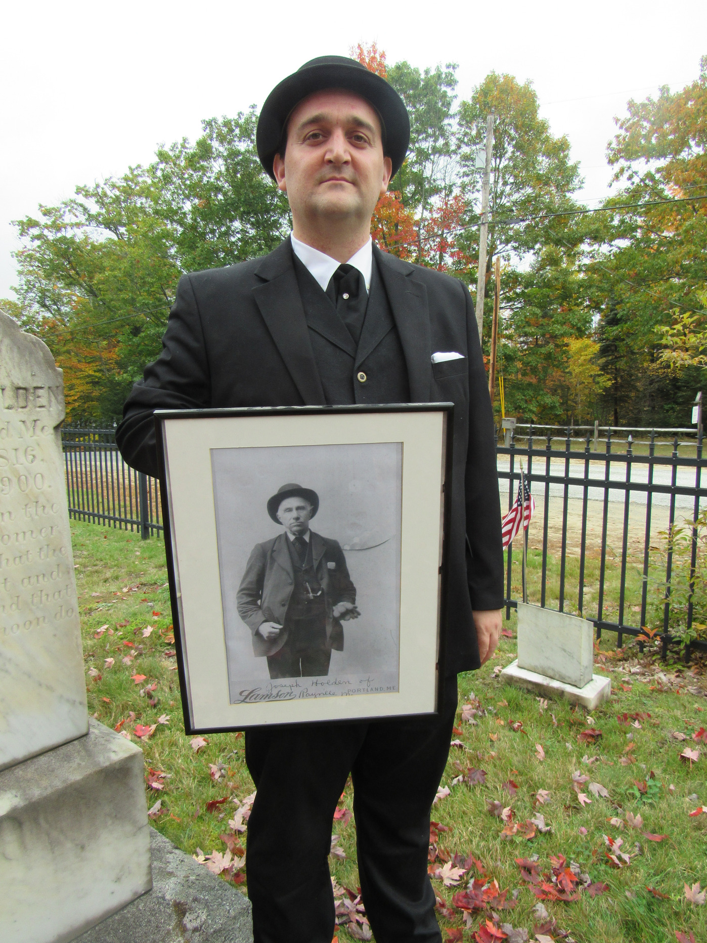 Derek Dorr with photo of Joe Holden