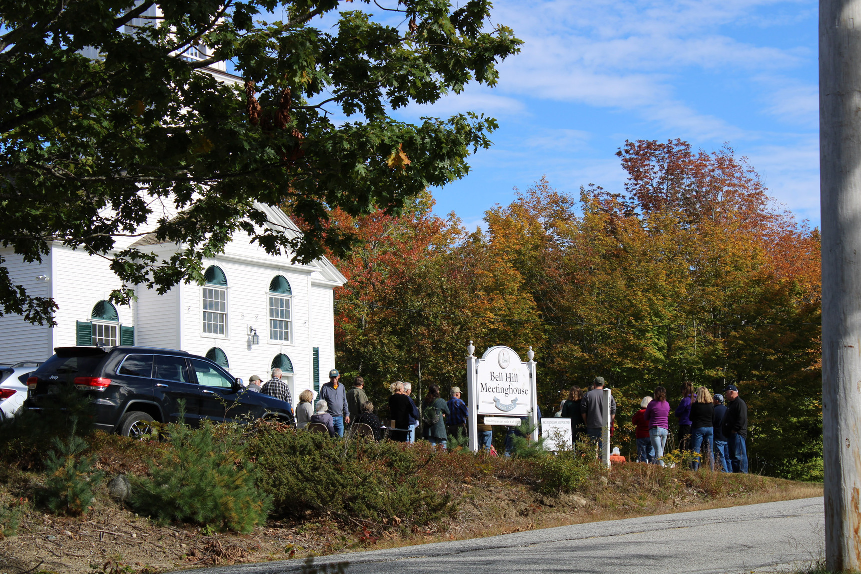A tour group gathered to hear the history of the Bell Hill Meetinghouse