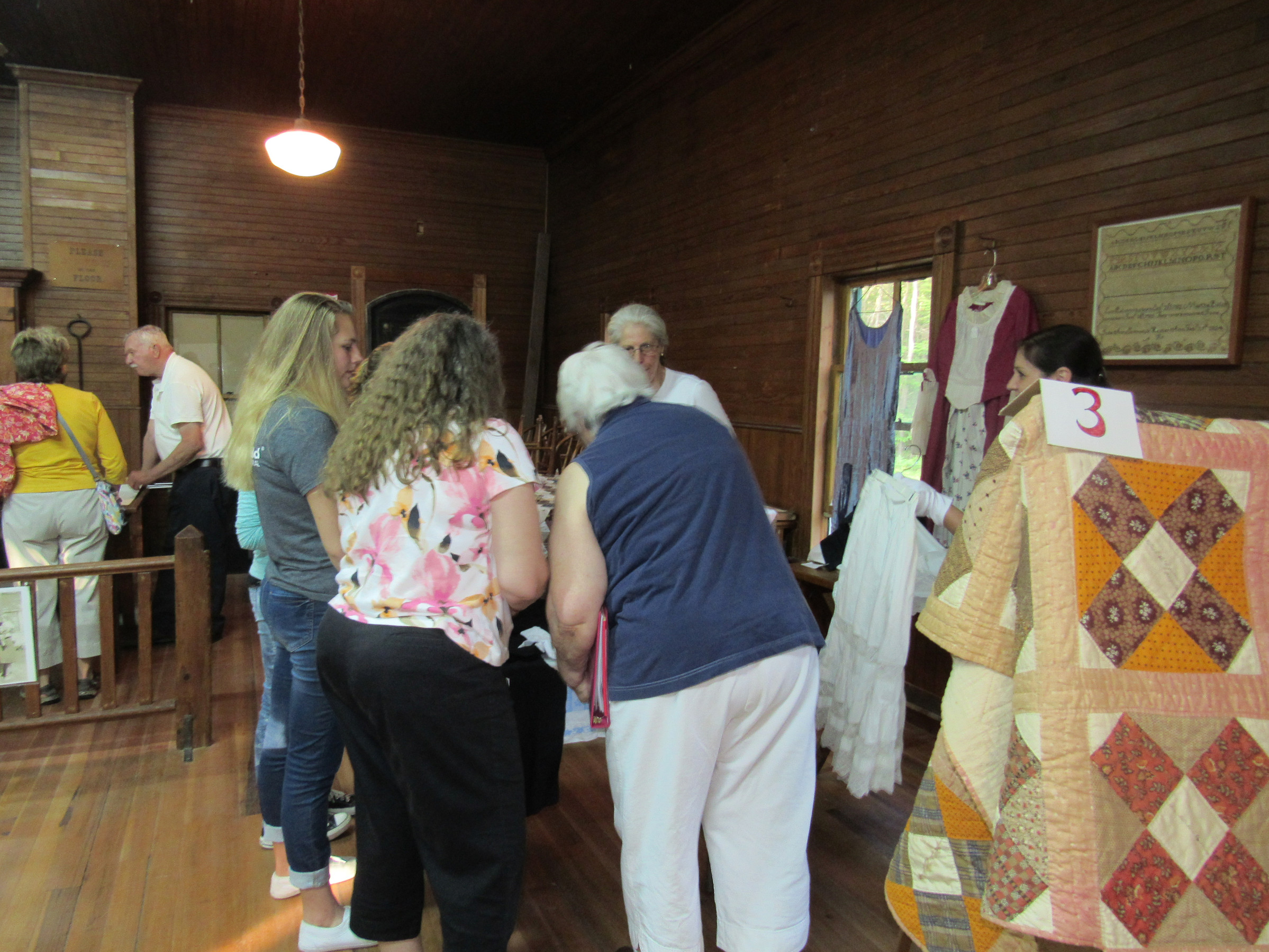 President Shirley Hamilton provides guests with information