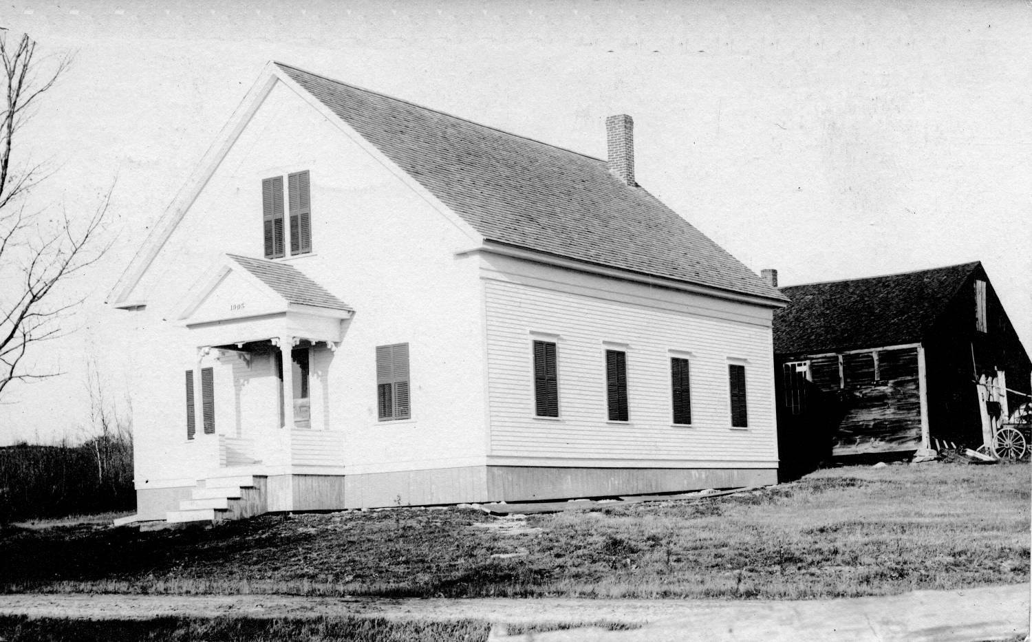 Town House, built 1905, an unusual photo because it shows the carriage sheds in the rear