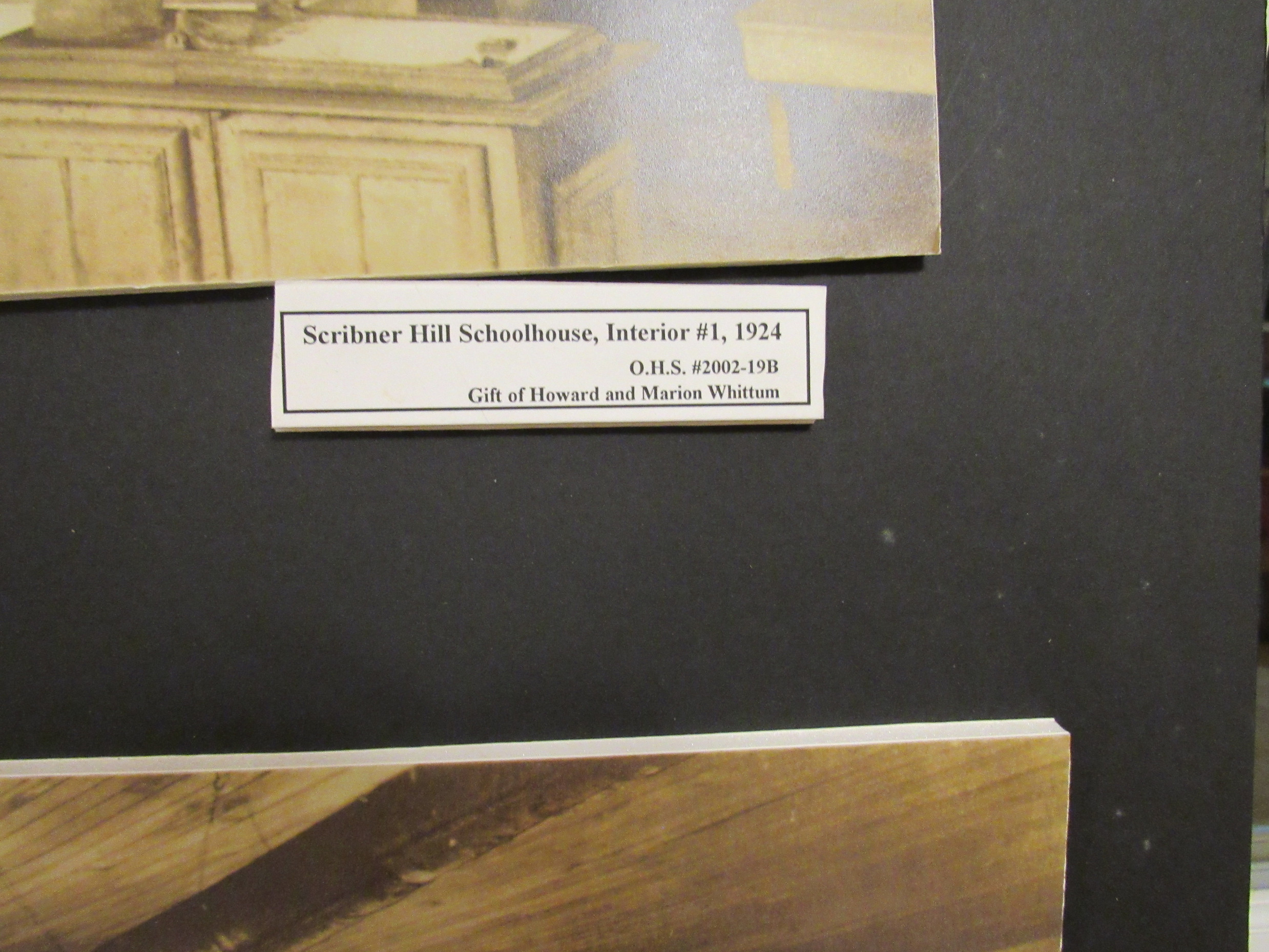 Photograph of Scribner Hill Schoolhouse interior 1, 1924 identification label.