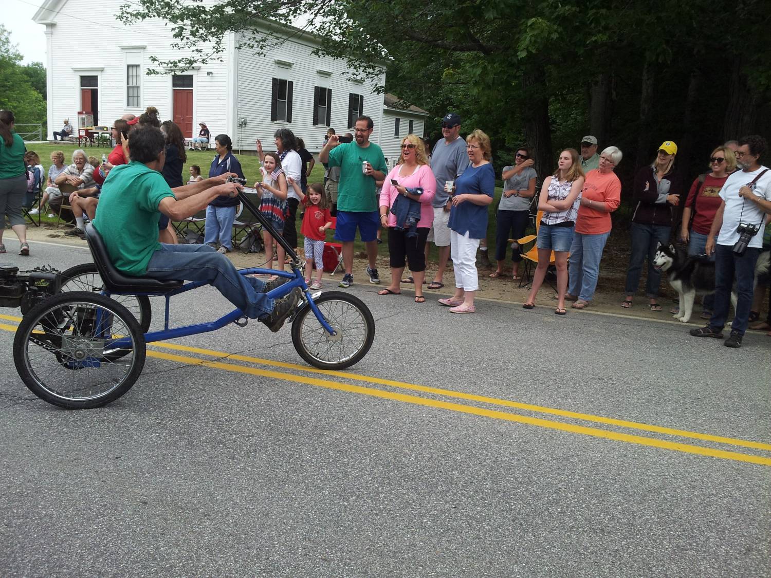 Recumbent tricycle in the parade at the Fourth of July parade.