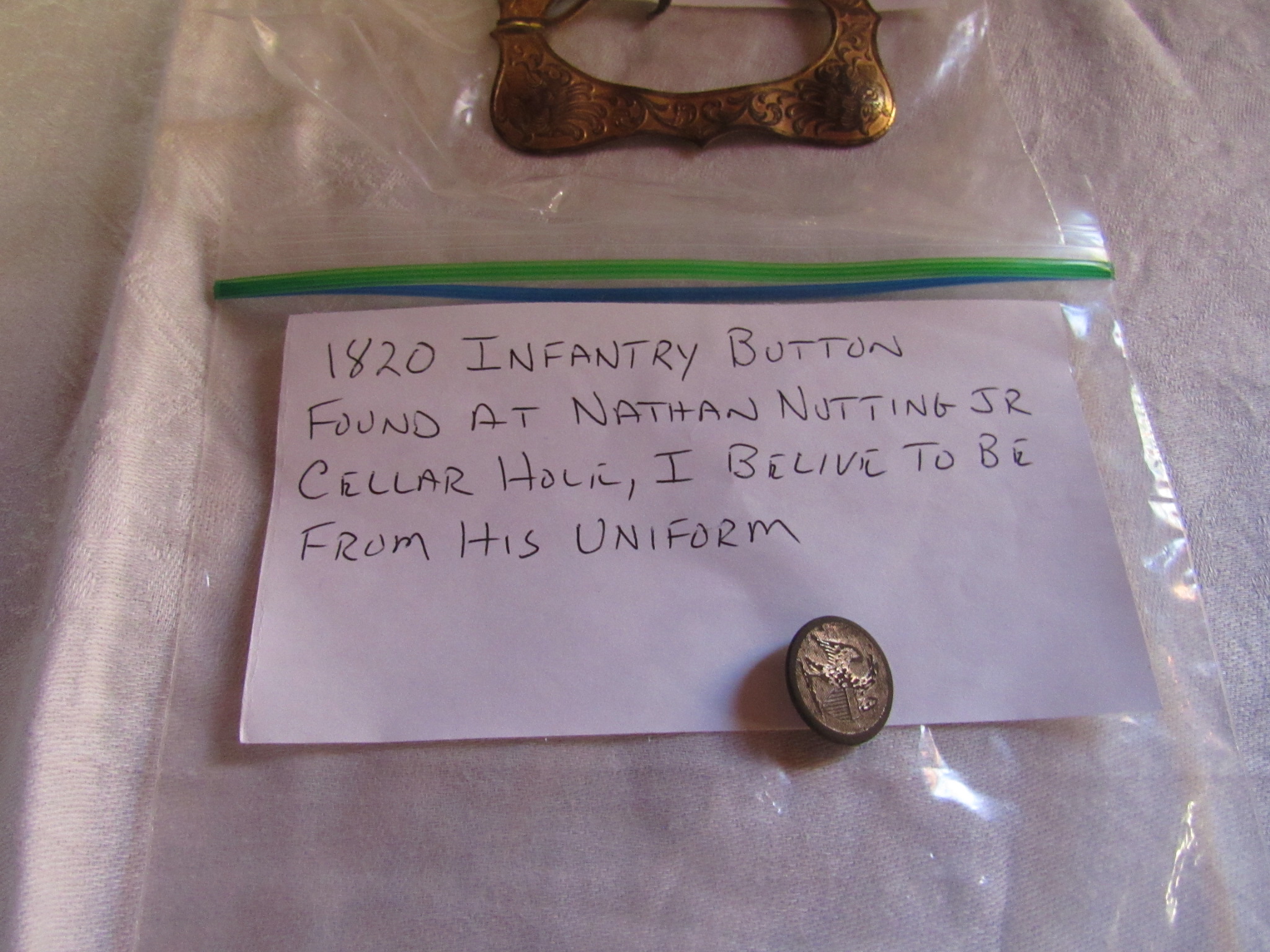1820 Infantry Button. Found at Nathan Nutting Jr cellar hole. “I believe to be from his uniform” – Larry Nadeau