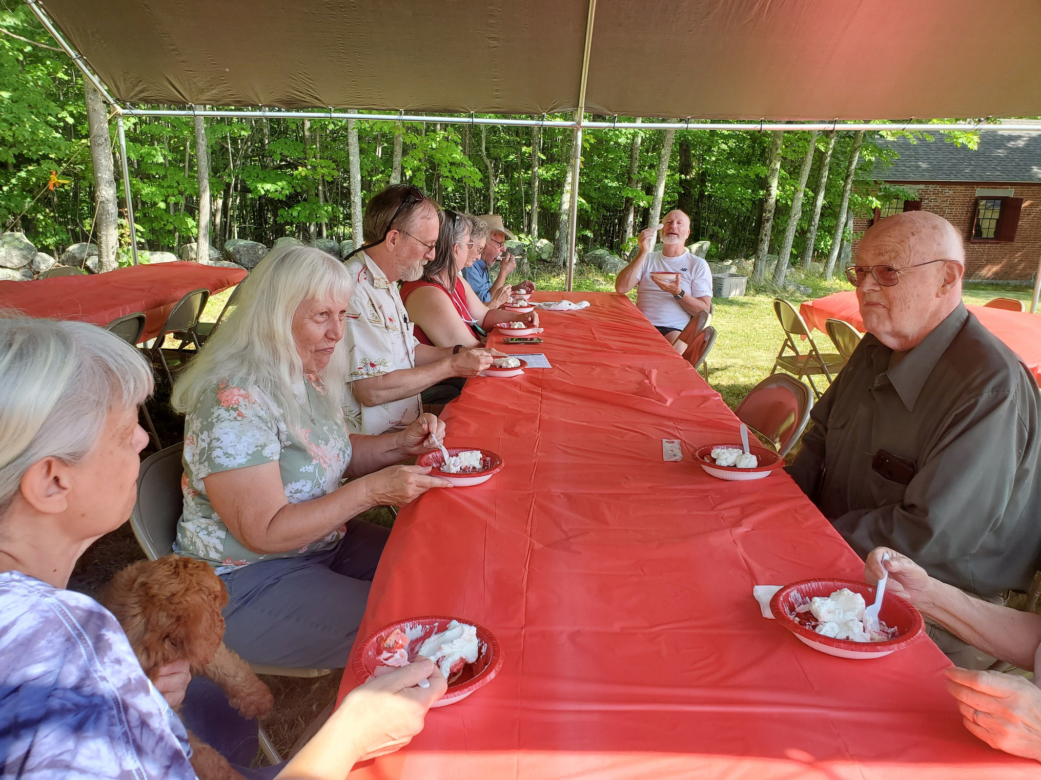 Guests gathered outdoors for refreshments at the Strawberry Festival at Bell Hill Meetinghouse.
