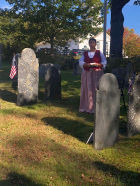 Costumed presenter at a cemetery program