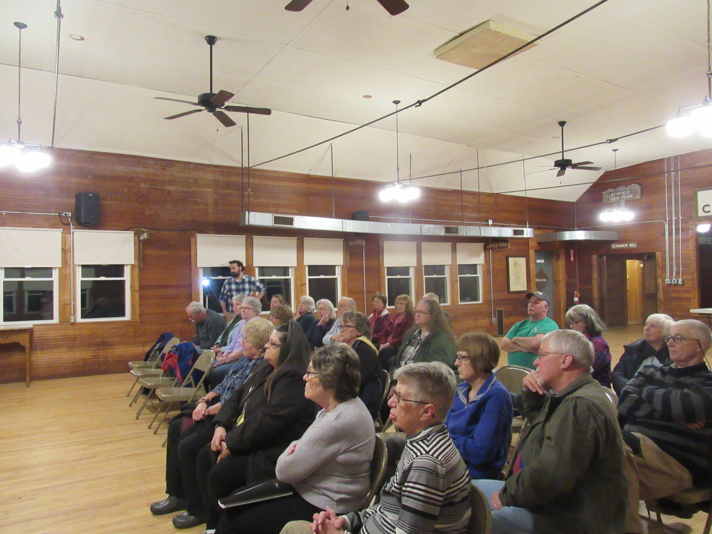 Audience attending a historical society presentation
