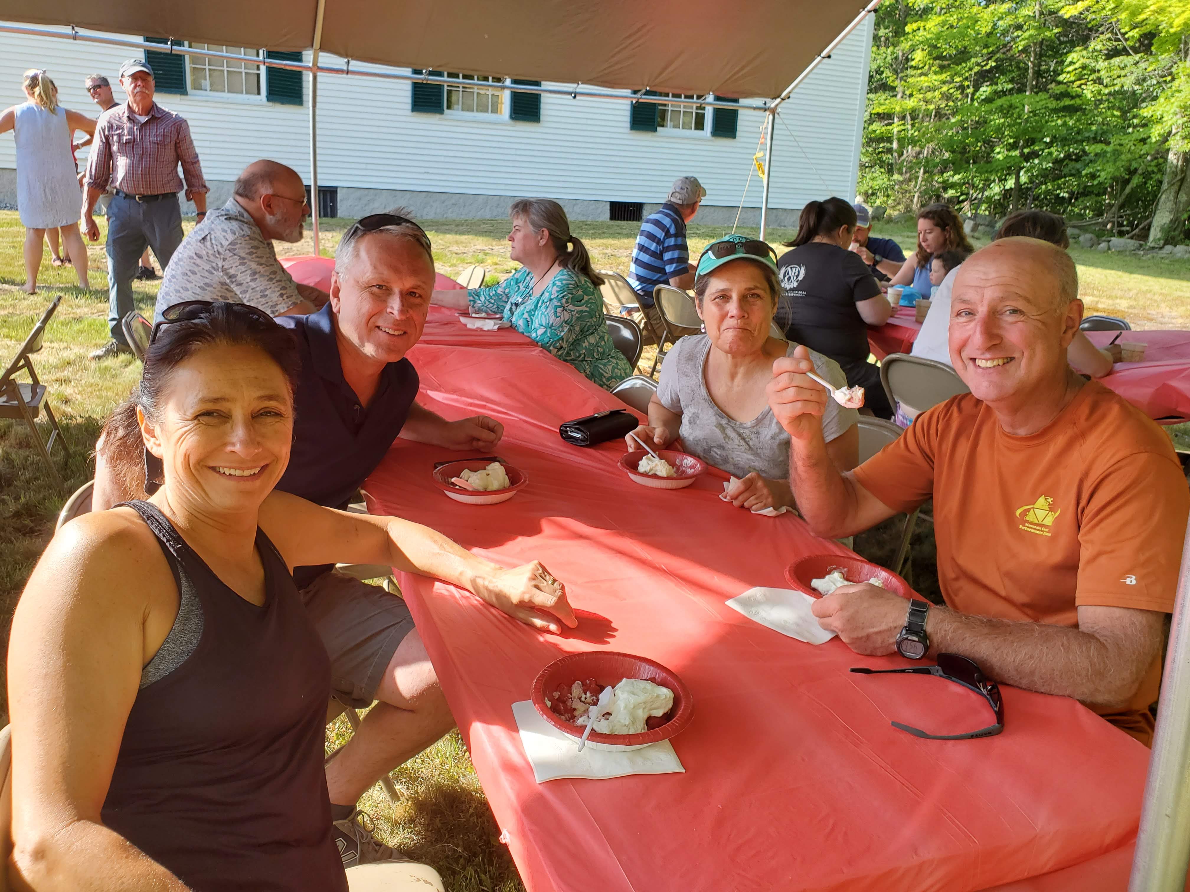 Guests gathered outdoors for refreshments at the Strawberry Festival at Bell Hill Meetinghouse.