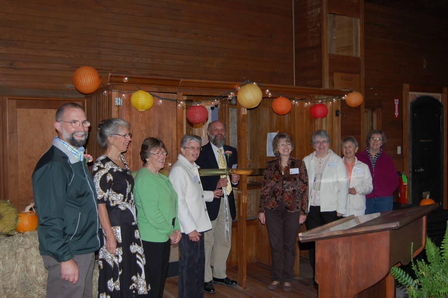 L-R are Ken Bartow, Shirley Hamilton, Callie Zilinsky, Jean Hankins, Henry Hamilton, Polly Bartow, Celeste Hyer, Jean Pottle, Ethel Turner, at archives ribboncutting and dedication, Oct 2013