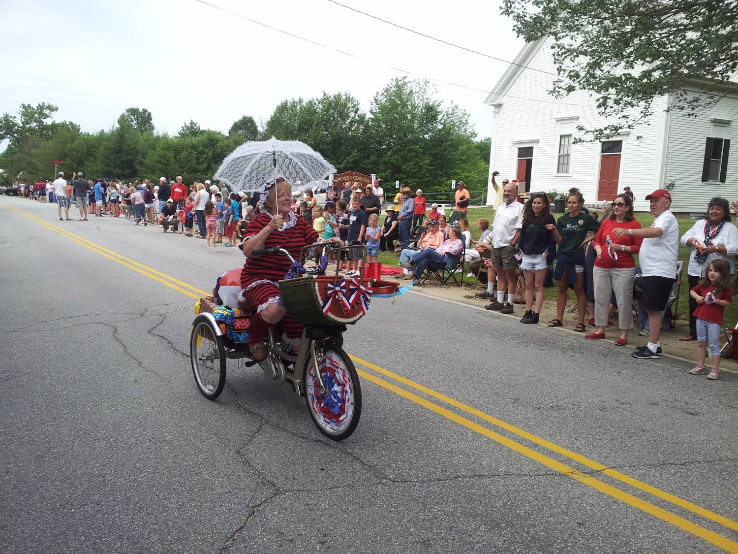 Decorated tricycles and patriotic costumes at the Fourth of July parade.