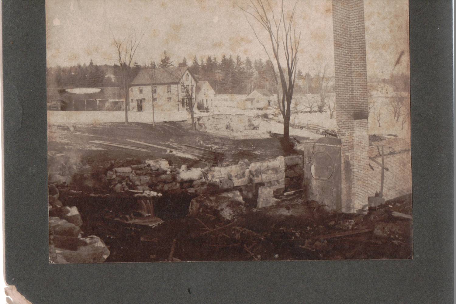 Remains of Kemp Brothers mill in E Otisfield after it burned, undated