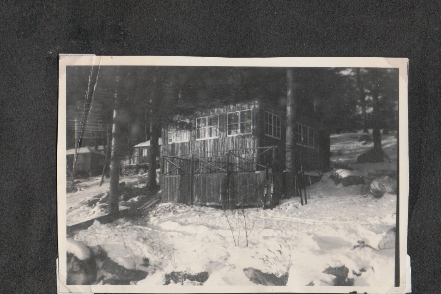 Cabin at Camp Ohuivo during winter, from Tucker album