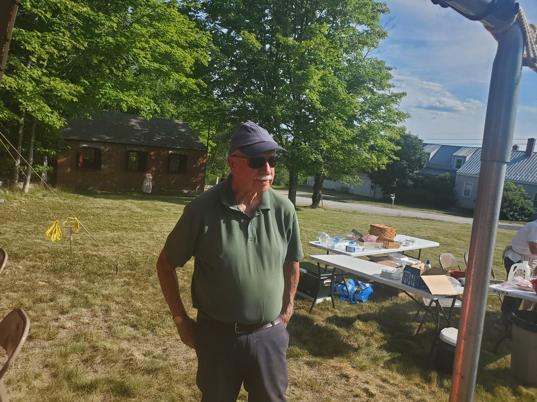 Guests gathered outdoors for refreshments at the Strawberry Festival at Bell Hill Meetinghouse.