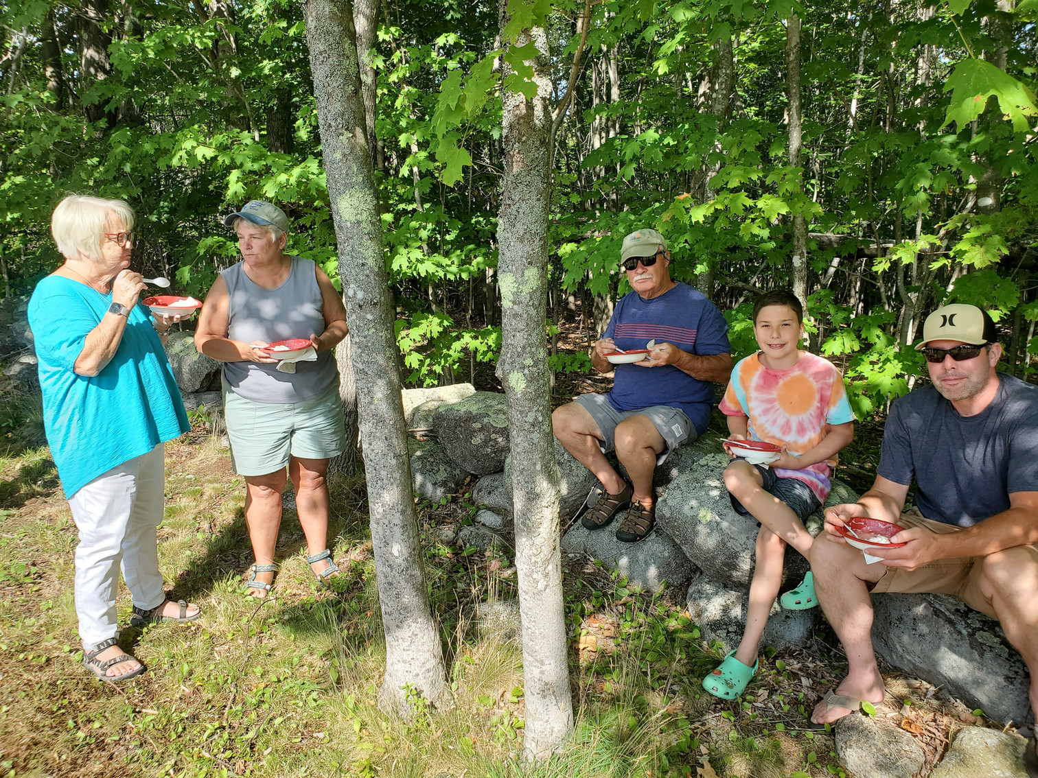 Guests gathered outdoors for refreshments at the Strawberry Festival at Bell Hill Meetinghouse.