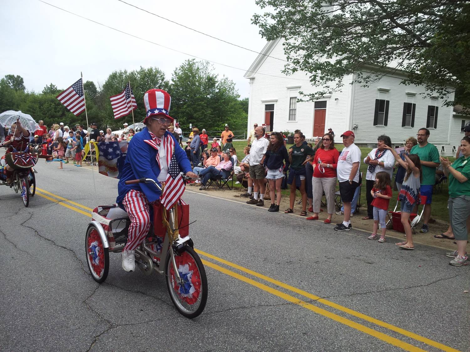 Decorated tricycles and patriotic costumes at the Fourth of July parade.
