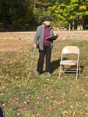 Costumed presenter at a cemetery program