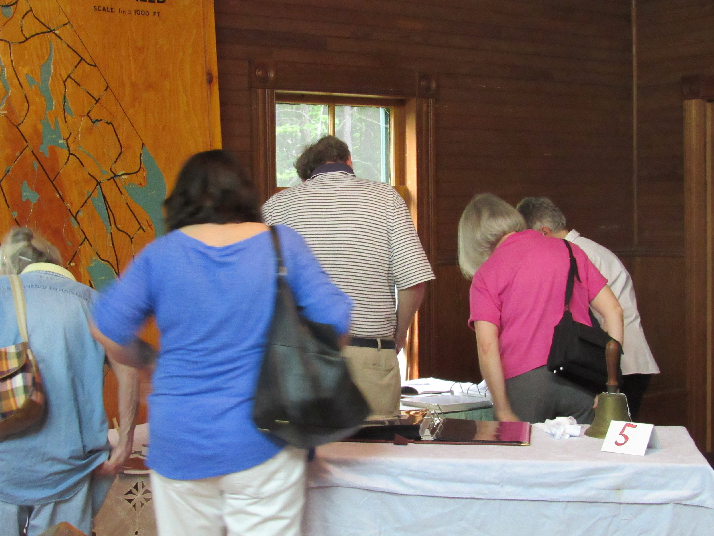 Archivist Jean Hankins provides information to guests