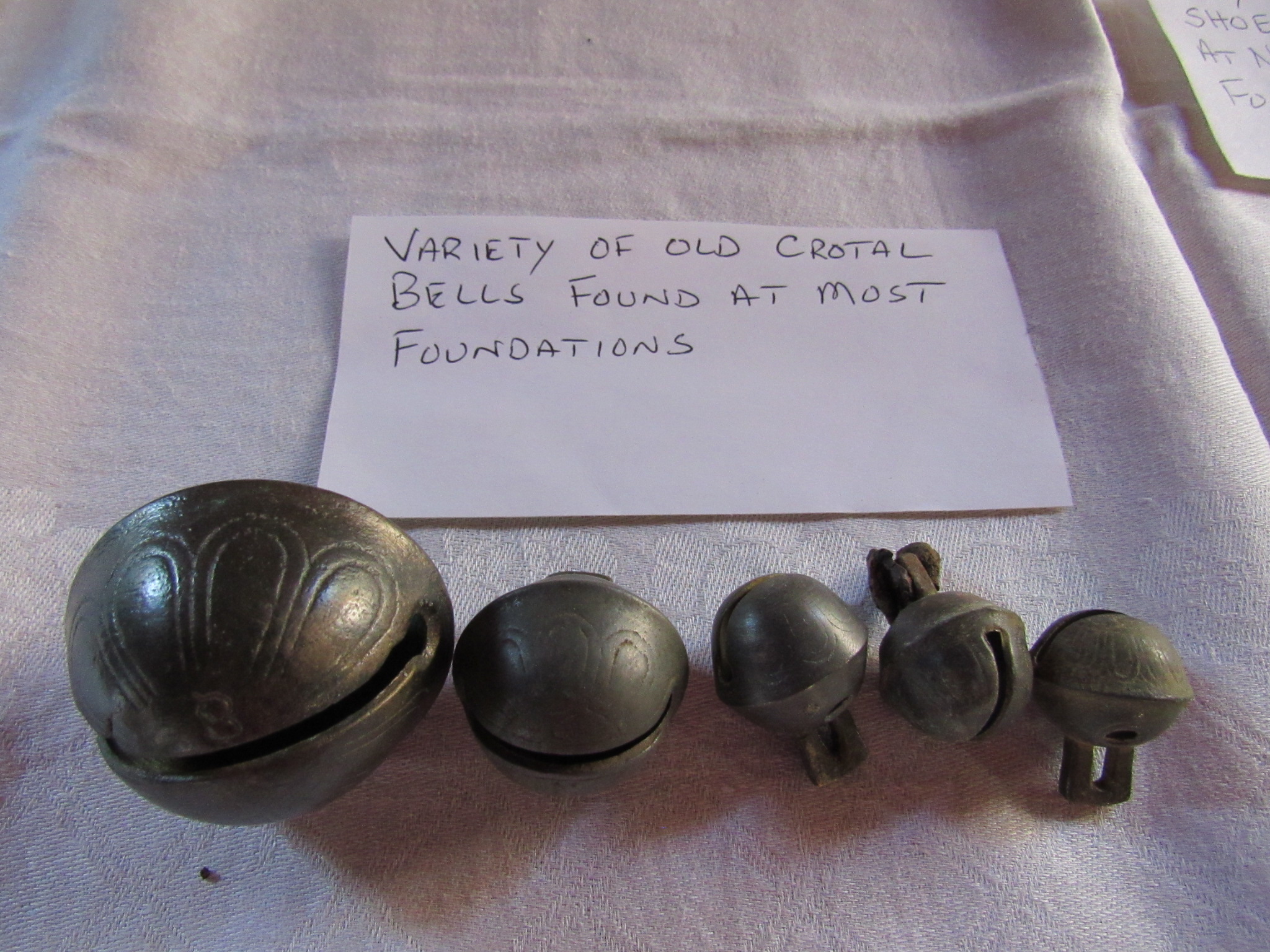 Variety of old crotal bells found at most foundations