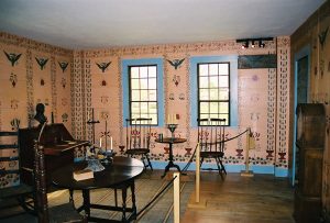 Stencil House at Shelburne Museum. A furnished room with stenciled walls at the Shelburne Museum.