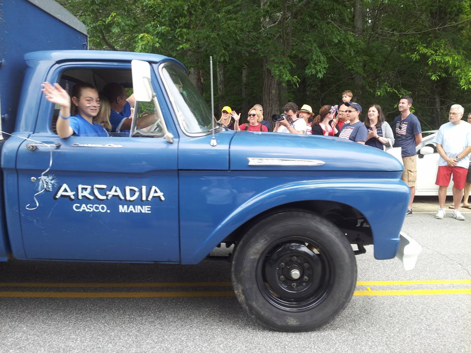 Camp Arcadia blue truck at the Fourth of July parade.