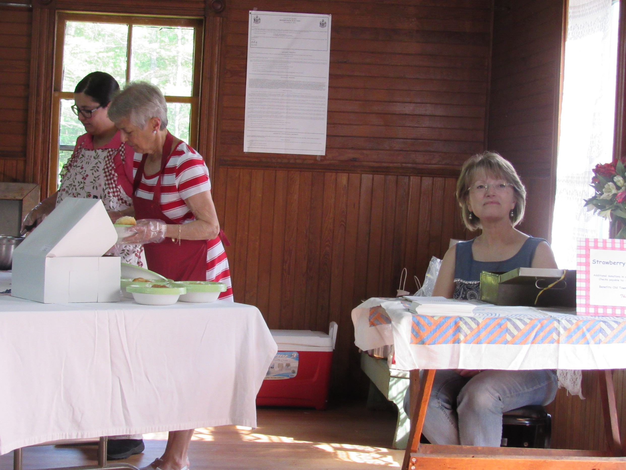 Treasurer Polly Bartow, Secretary Jean Pottle and Volunteer Jessica Dorr help to serve the first customers at our Annual Strawberry Festival