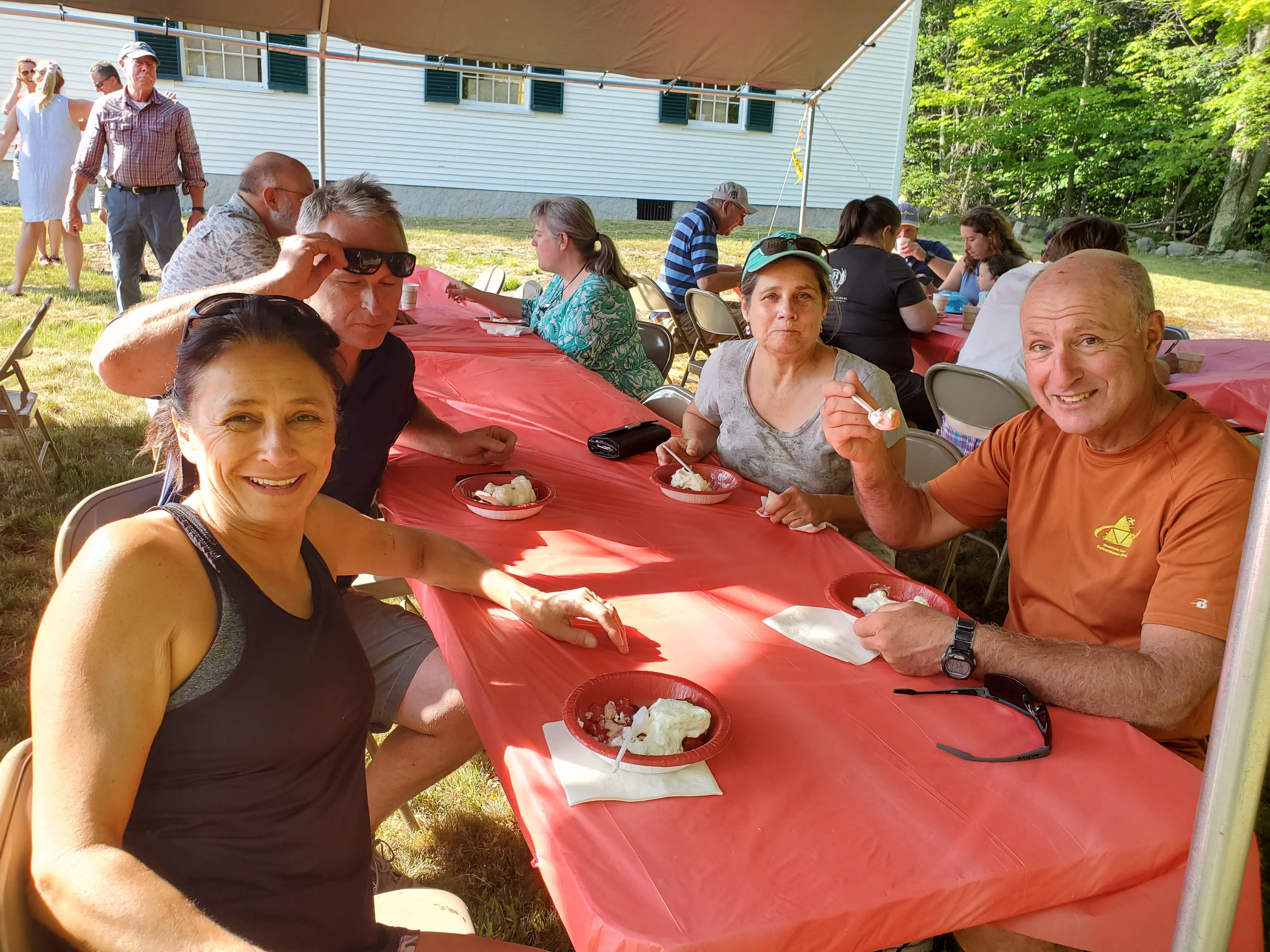 Guests gathered outdoors for refreshments at the Strawberry Festival at Bell Hill Meetinghouse.