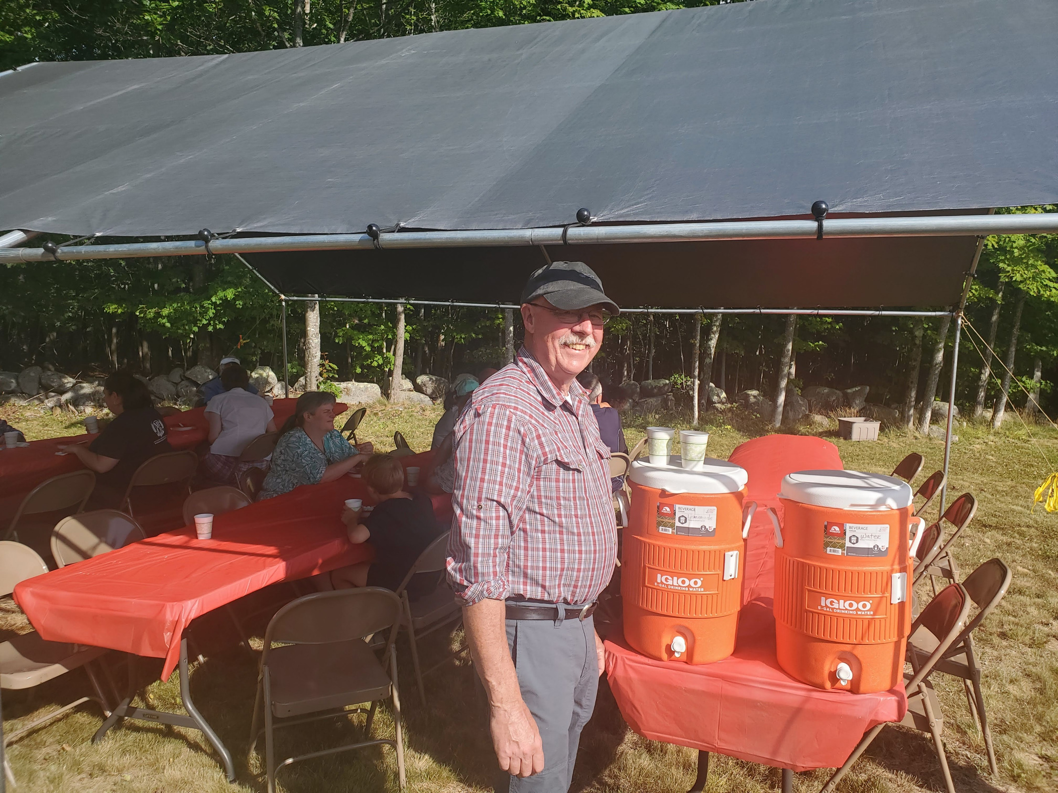 Guests gathered outdoors for refreshments at the Strawberry Festival at Bell Hill Meetinghouse.