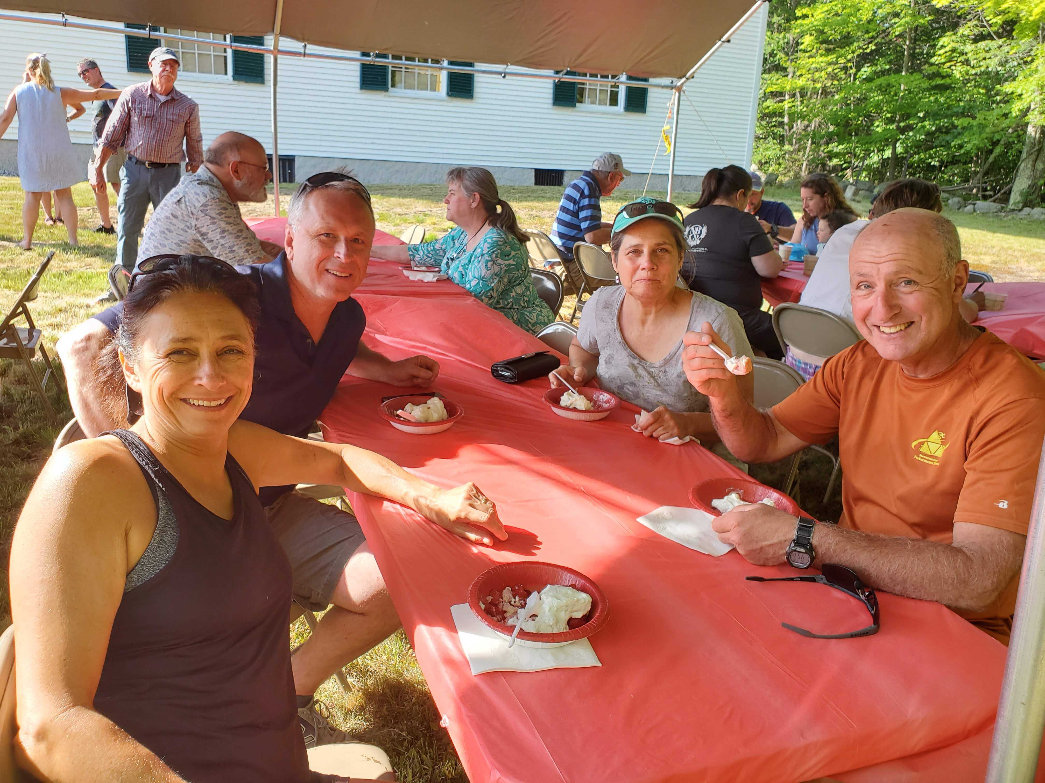 Guests gathered outdoors for refreshments at the Strawberry Festival at Bell Hill Meetinghouse.