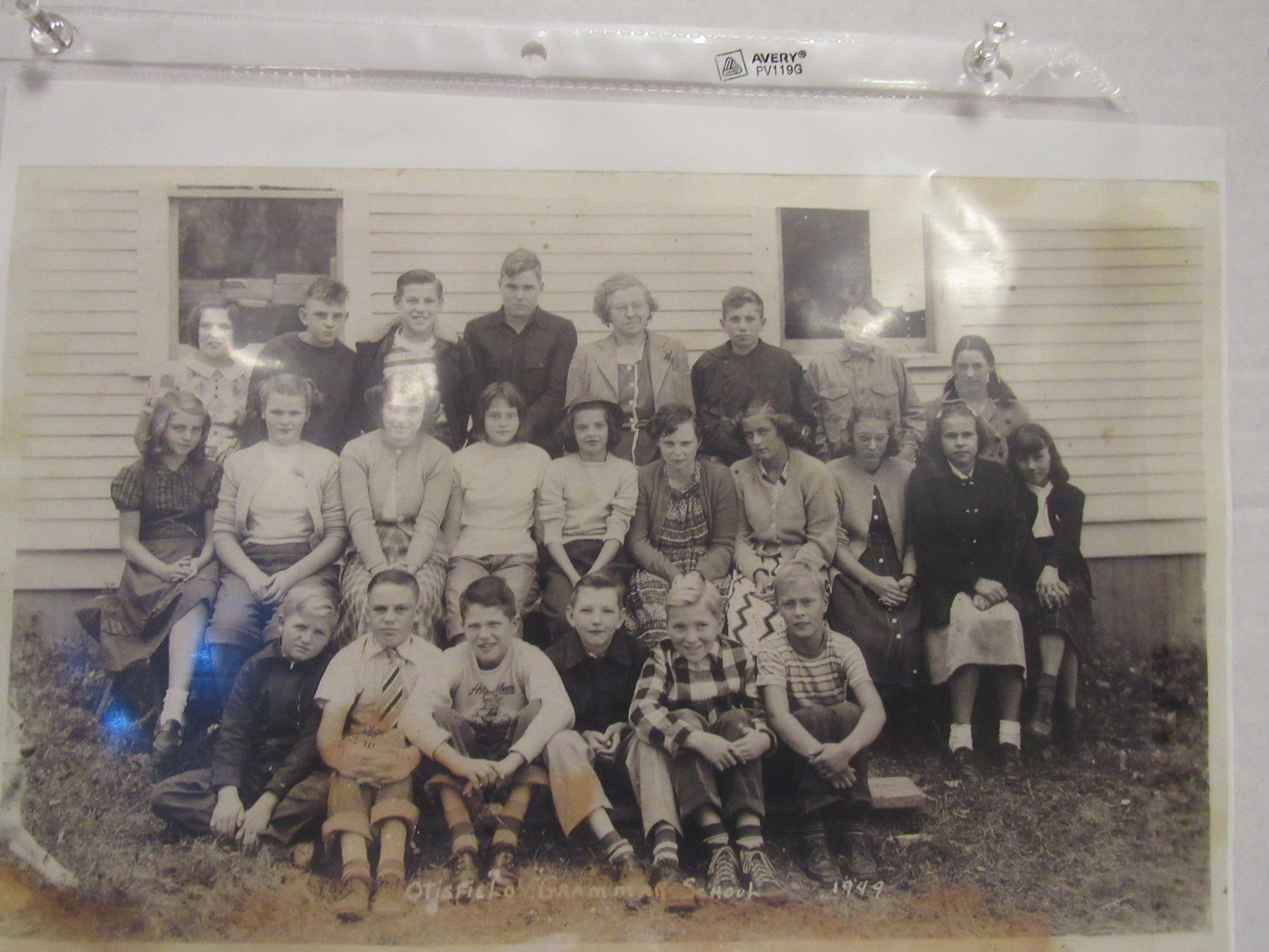 Otisfield grammar school grades 6–8, 1949. A companion identification sheet records the names associated with this photograph.