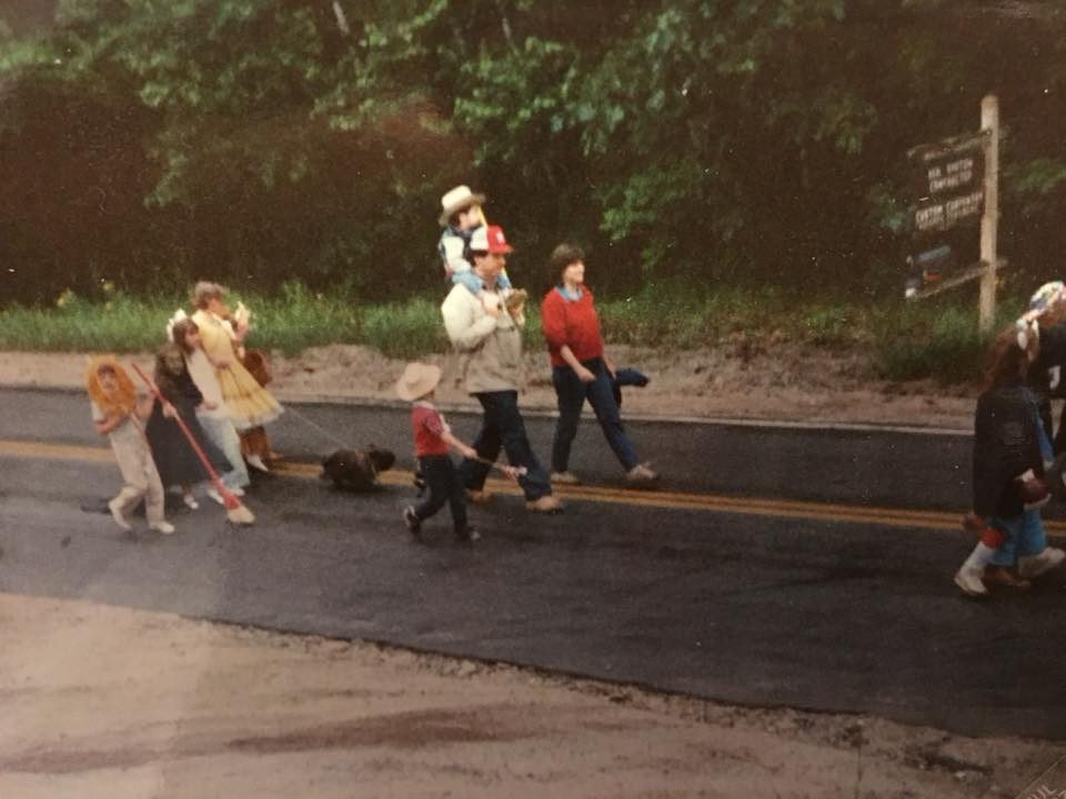 Otisfield 4th of July parade 1987. Stacy, Jenny, and Eric Cavers along with Justin Adams are the characters from The Wizard of Oz. Toto is played by Heidi Bartow Donated by Polly Bartow