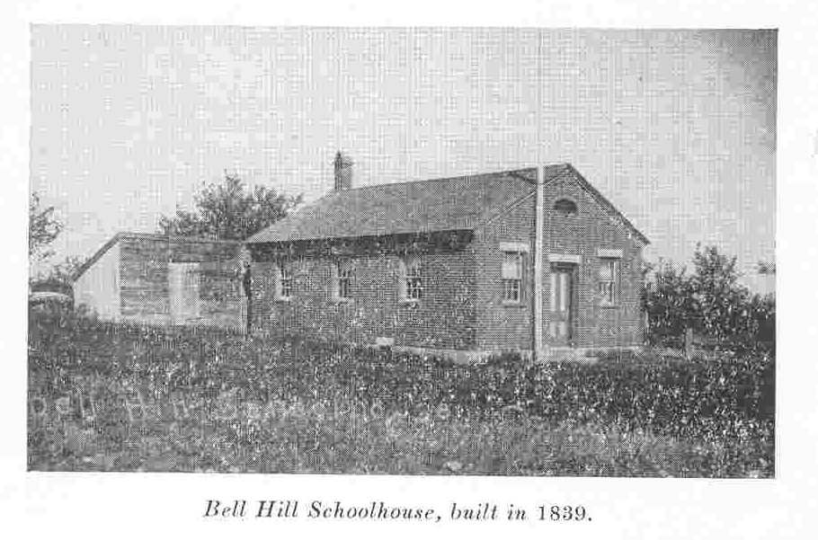 Photograph of Bell Hill Schoolhouse, printed historical caption.