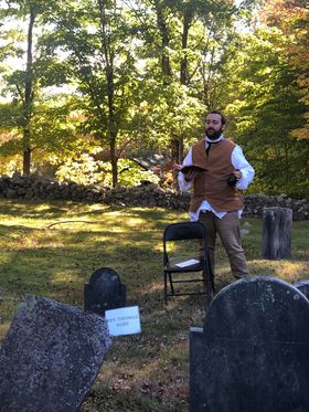 Costumed presenter at a cemetery program