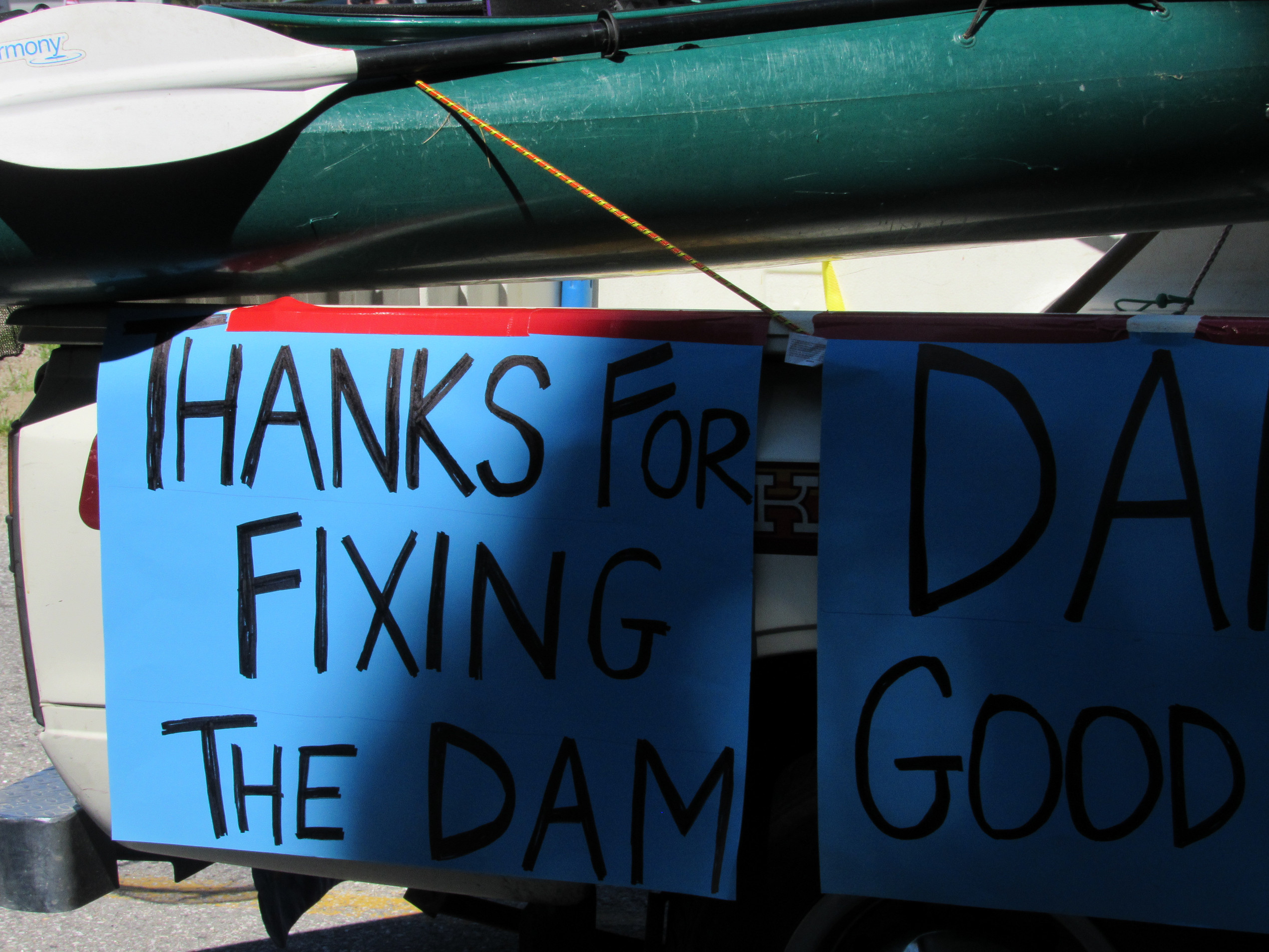 Pleasant Lake dam-repair thank-you sign at the Fourth of July parade.