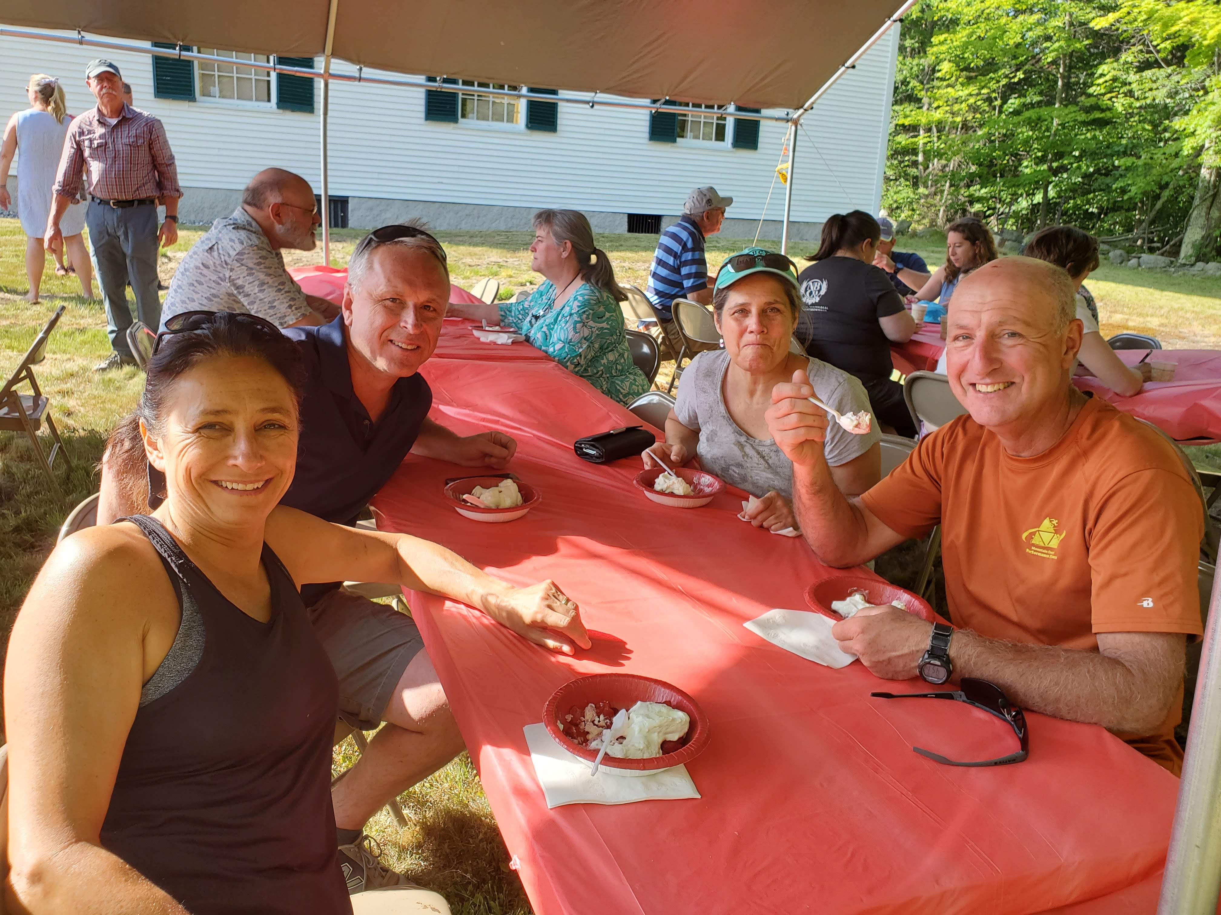 Guests gathered outdoors for refreshments at the Strawberry Festival at Bell Hill Meetinghouse.