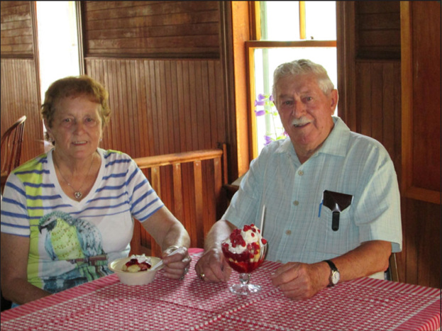 Two visitors enjoying sweet shortcake at the Town House, July 2014.