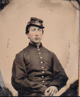 Seated portrait of Algernon Scribner wearing his Civil War uniform and cap.