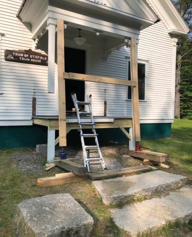 The front entrance of the Town House as repairs begin